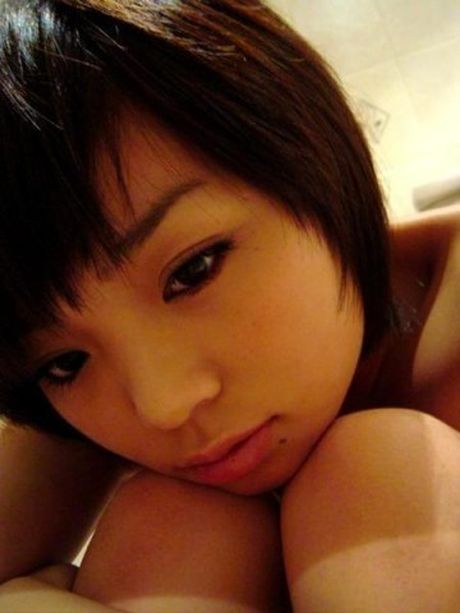 sweet girl naked on the floor looking up